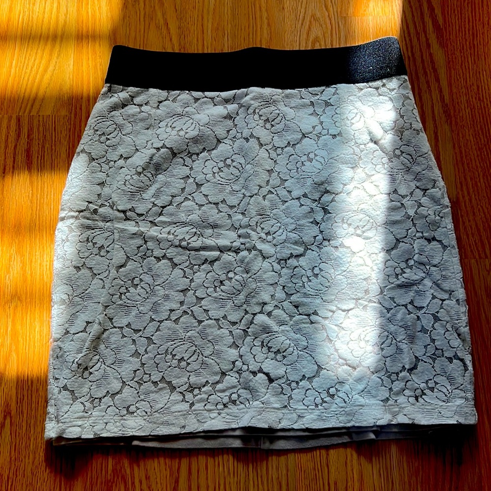 Size 8 black, white, lace mini skirt - in great condition -